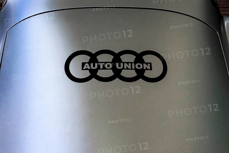 Historic logo of Auto Union with four rings of Audi on body of historic racing car sports car hiker Streamline Special, Classic Days