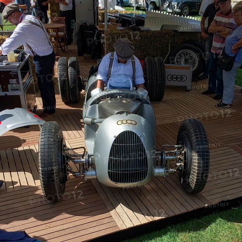 Car mechanic from Audi Tradition prepares historic racing car from Auto Union for car racing show at Classic Days, Schloss Dyck