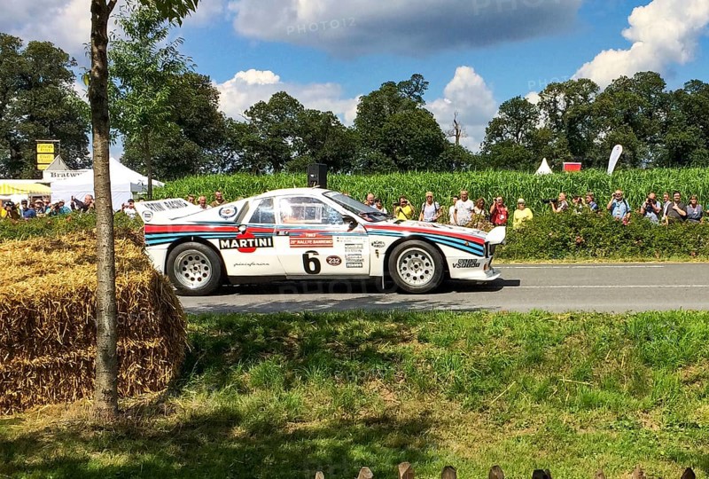 Classic historic racing car Lancia Rally 037 Martini Racing for rally group B at show race for classic cars, driver Walter Roehrl