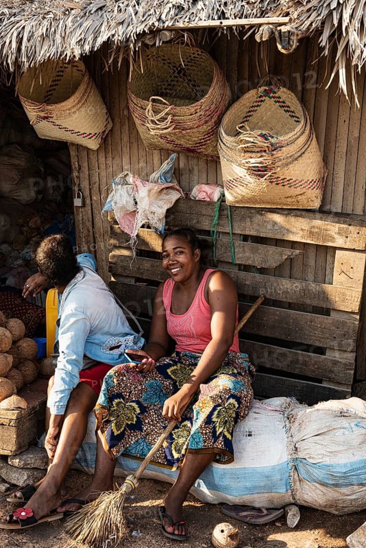 Two market woman, raffia baskets