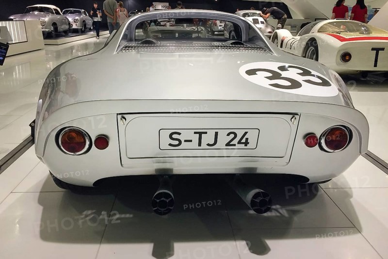 Rear view double pipe exhaust system exhaust pipes of sports car racing car Porsche 904 GTS with road approval developed by designer Ferdinand Butzi Porsche Jr. Porsche Museum, Stuttgart Zuffenhausen