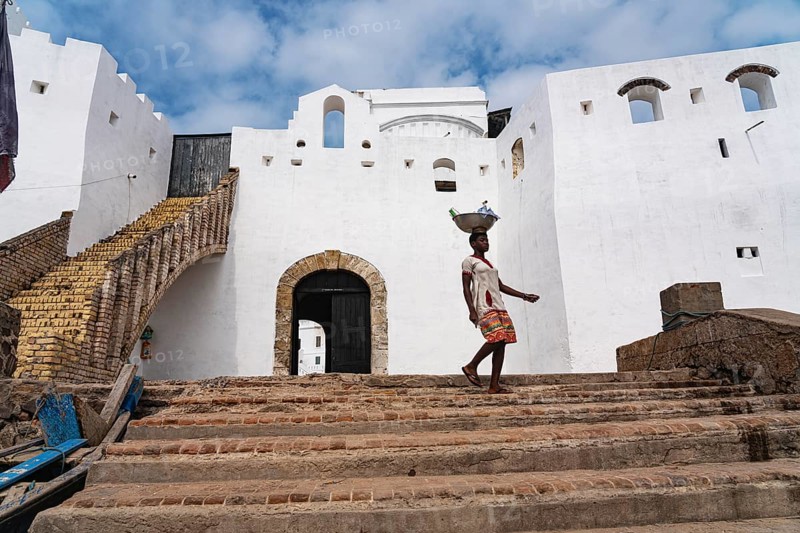 Man on stairs, entrance to Cape Coast Castle
