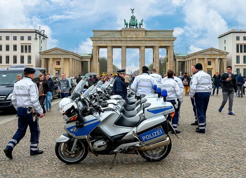 Berlin police motorbike squad stands in front of the Brandenburg Gate, Berlin
