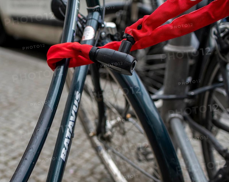 Red safety lock on bicycle, Berlin