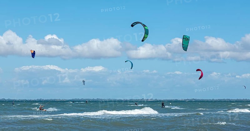 Kitesurfer in front of Graswarder peninsula, Heiligenhafen