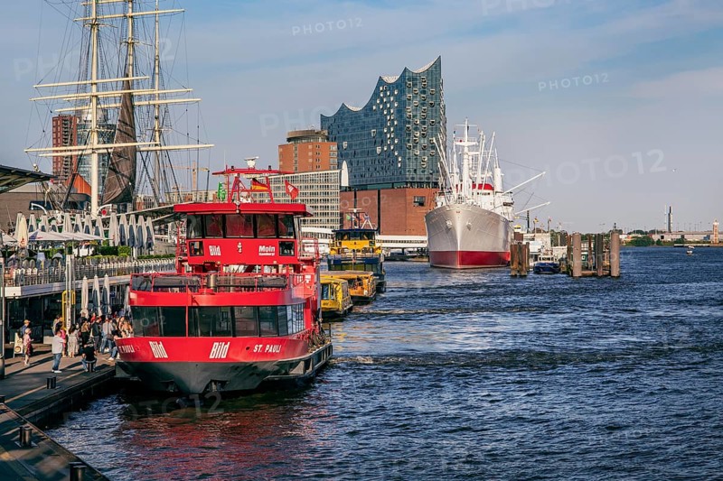Harbour ferries at the St. Pauli Landungsbruecken with the Elbe Philharmonic Hall on the Elbe in the Port of Hamburg, Hamburg