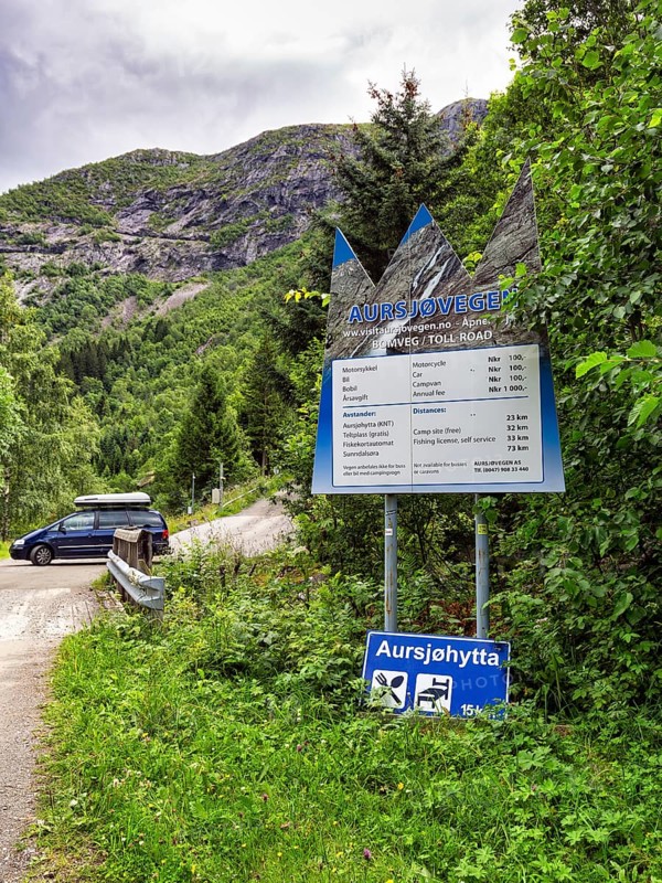 Access to the toll road with information board, price board