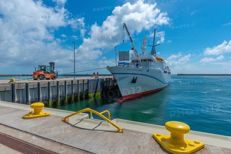 Excursion ship, containers being unloaded by crane