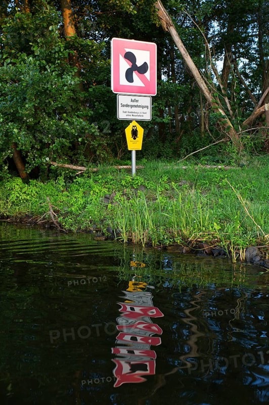 Signs prohibiting motoring and nature reserve on a stretch of water in the middle Havel, Brandenburg
