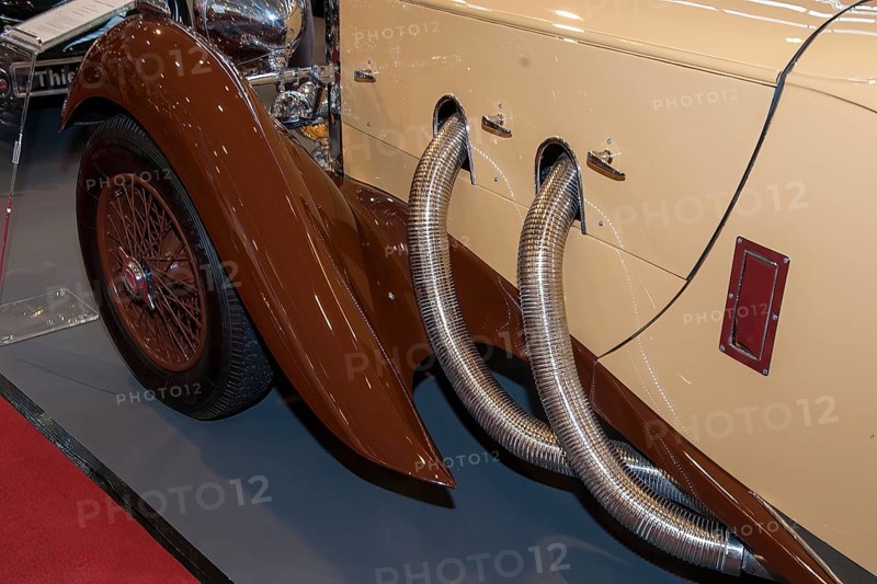 Detail of bonnet with visible exhaust pipes from historic classic sports car Classic Car Roadster Lagonda LG 45 Rapide from 30s 1937 by Clark Gable, constructor W. O. Bentley