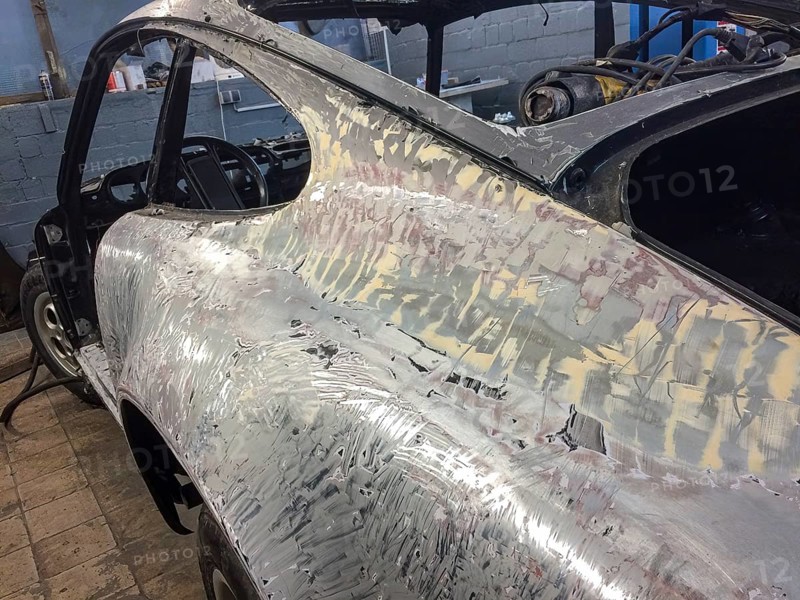 Body of historic classic sports car classic car Porsche 911 G model is prepared for restoration reconstruction derusted stripped of paint, Germany
