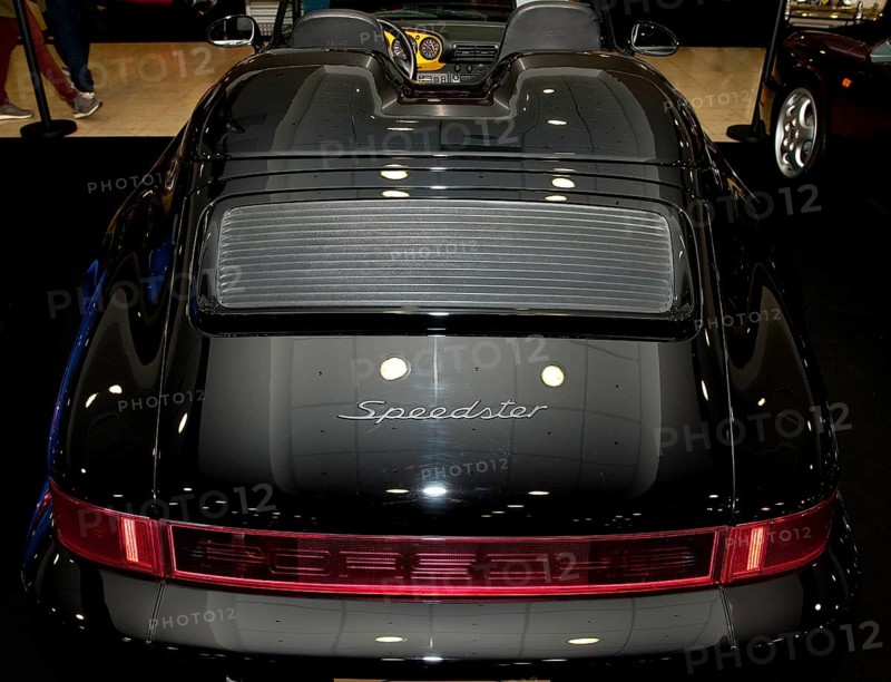 Historic Oldtimer Classic Car Porsche 911 964 Speedster with typical two humps over rear seats covered rear bench in design of body, fair Techno Classica
