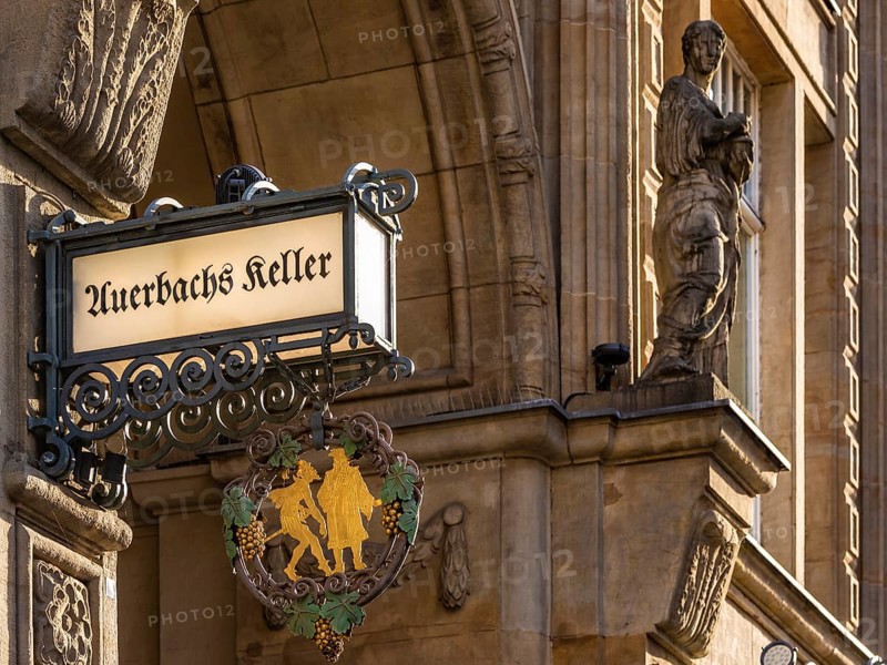 Inn sign Auerbachs Keller at the entrance of the Maedlerpassage, nose sign