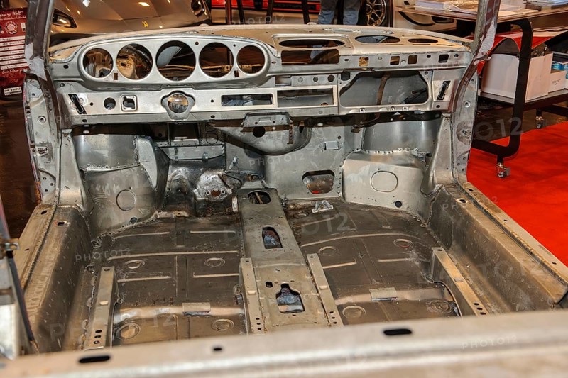 Gutted interior of stripped body without paint for restoration Reconstruction of historic classic sports car Classic Car Porsche 911, Messe Techno Classica