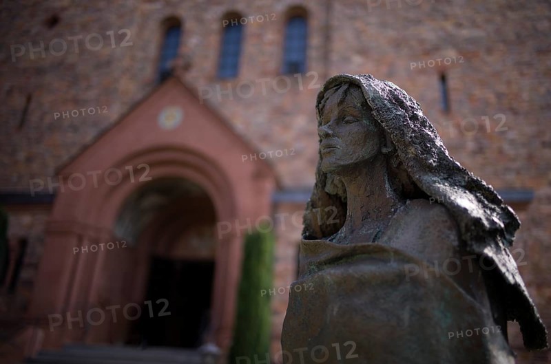 Statue of Saint Hildegard of Bingen in front of the abbey church, St. Hildegard Abbey