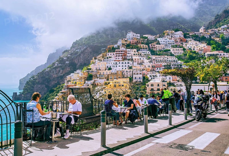 Street restaurant with panorama of the village, Positano