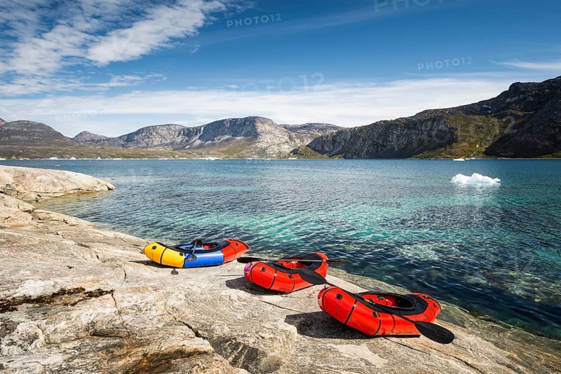 3 Packrafts on rocks