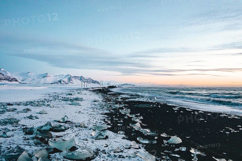 View over Diamond Beach in Iceland with Ice Cubes on the ground HQ