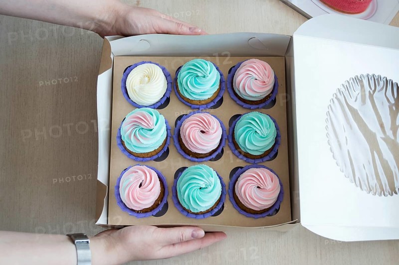 Flatlay cupcake box on the table