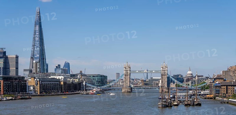 Tower Bridge The Shard ships and other skyscrapers on the Thames London England