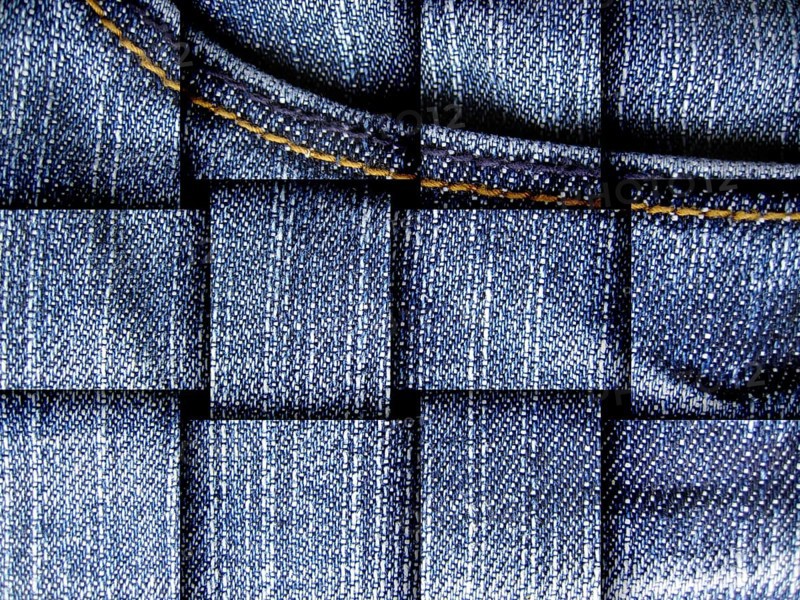 Denim jeans as blue background. With trouser pocket shown in the plane filling the image with fabric effect