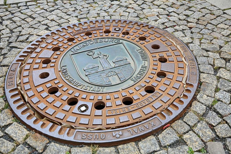 Manhole cover of Magdeburg with coat of arms of the city