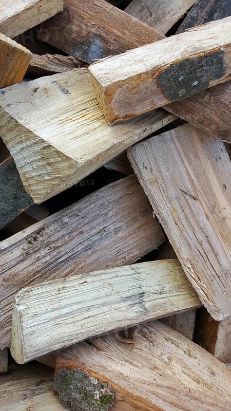 Delivery of firewood in the pile. Split and dried ready for the stove
