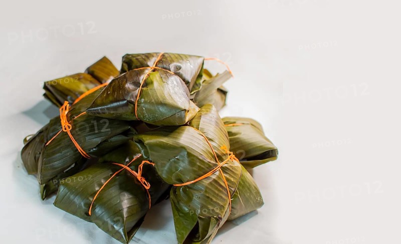 Traditional Nacatamales in banana leaves isolated