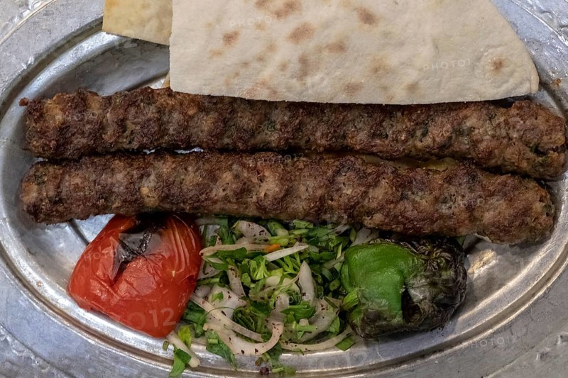 Serving of traditional urfa kebab in Gaziantep