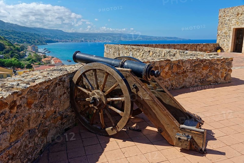 Old cannon on the castle and museum Castello Murat with sea view