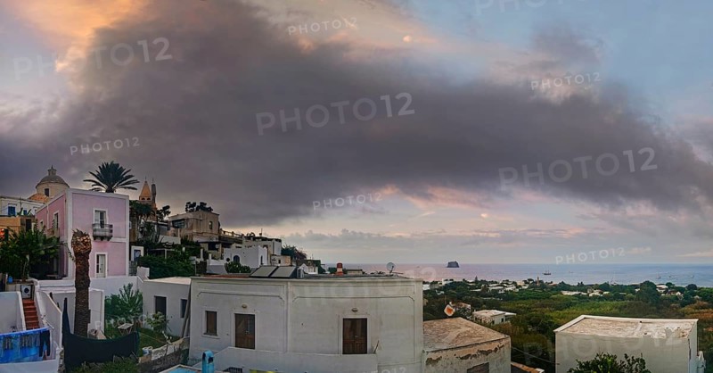 San Vincenzo island village and Stromboli volcano at sunset