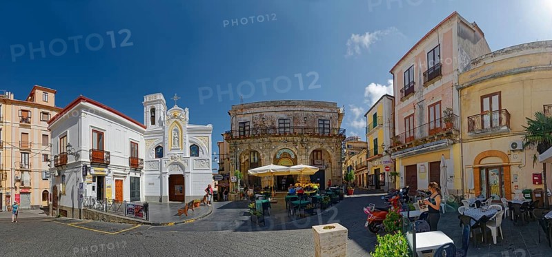 Piazza della Rebubblica with old historical house facades and the church Chiesa dellImmacolata of the town of Pizzo