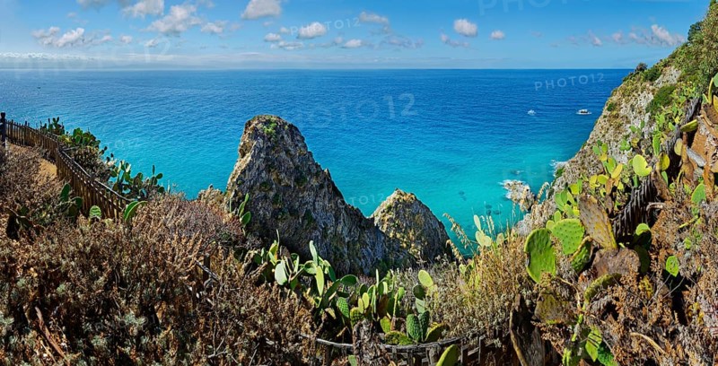 View of the rocks of Capo Vaticano with turquoise sea