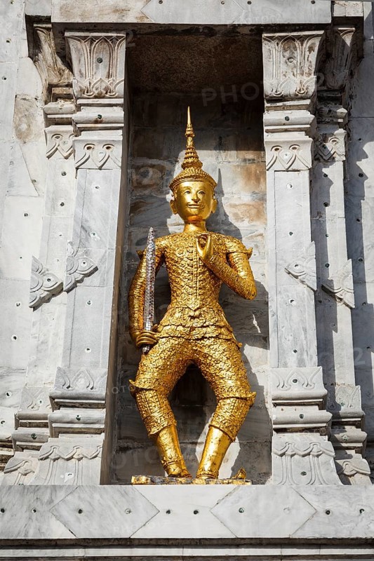 Gold guard on tower