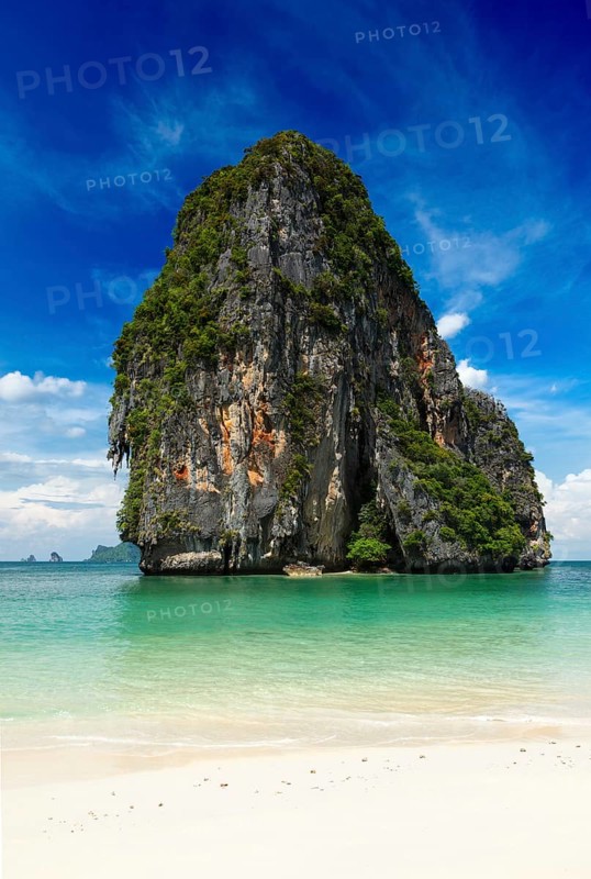 Fantastic idyllic tropical beach with picturesque limestone rock. Thailand
