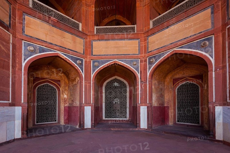 Arch with carved marble window. Mughal style. Humayun's tomb