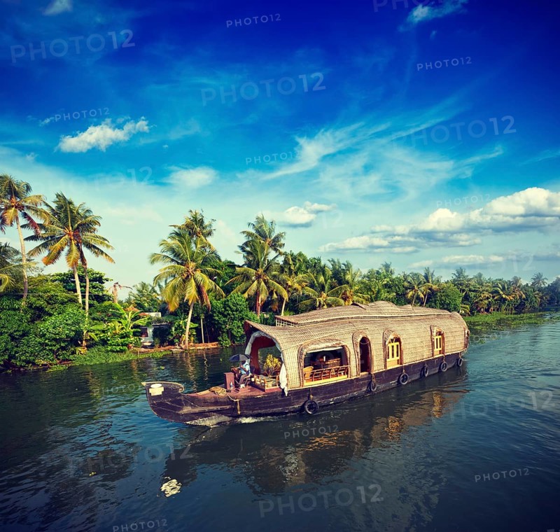 Vintage retro hipster style travel image of Kerala travel tourism background