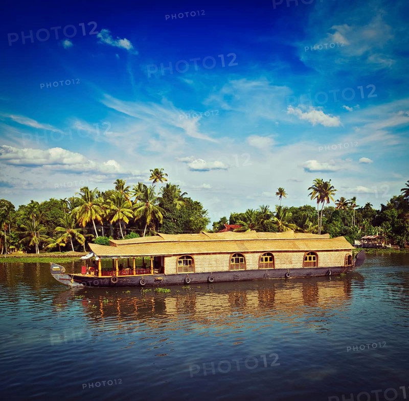Vintage retro hipster style travel image of Kerala travel tourism background