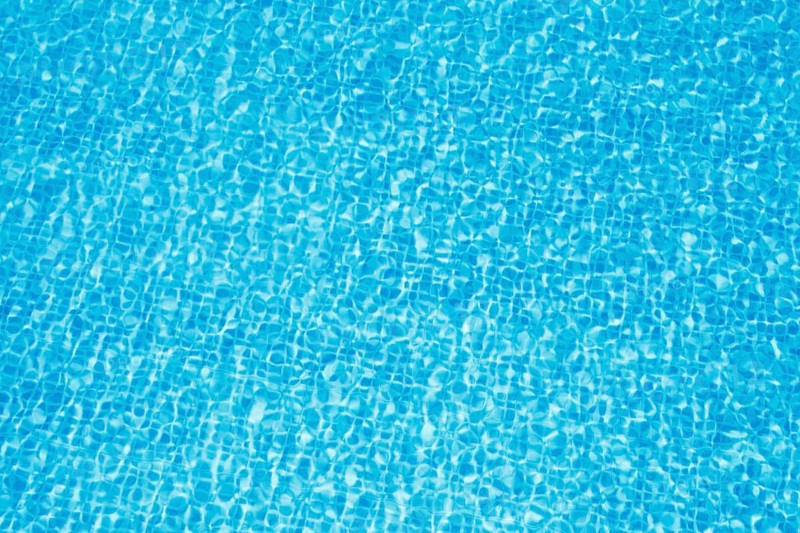 Clean blue water in pool