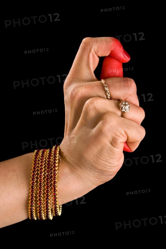 Woman hand showing Kapittha hasta