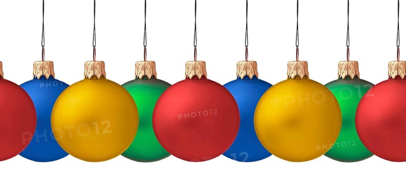 Row pf hanging Christmas baubles isolated on white background