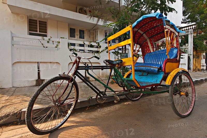 Empty bicycle rickshaw in street. Pondicherry