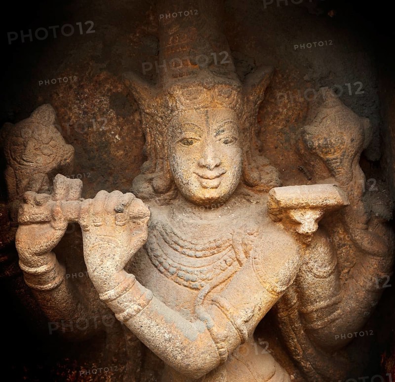 Krishna bas relief in Hindu temple. Sri Ranganathaswamy Temple. Tiruchirappalli