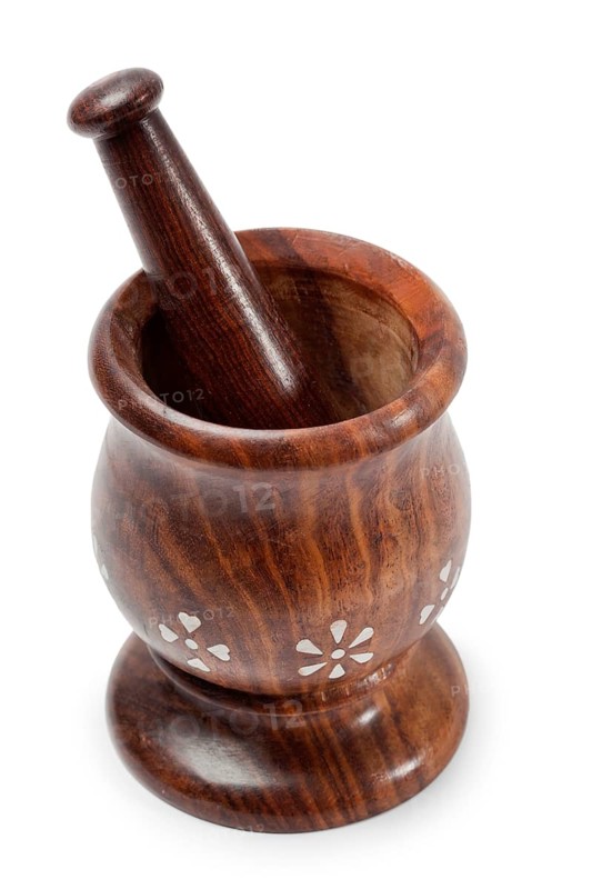 Wooden mortar and pestle isolated white background