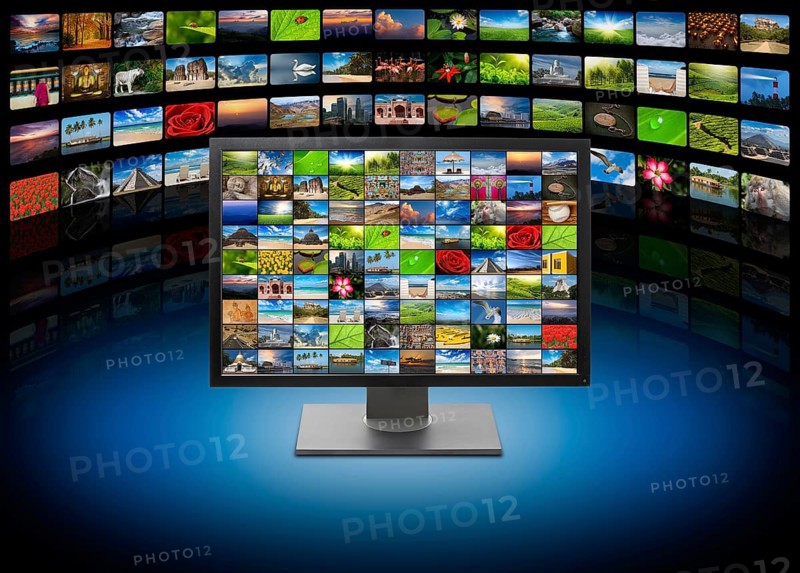 Monitor with images on multimedia background
