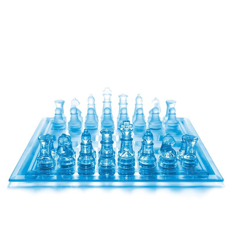 Glass chess on chess board