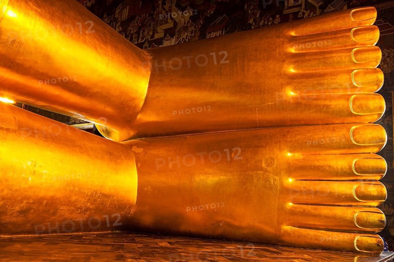 Reclining Buddha statue feet close up. Wat Pho
