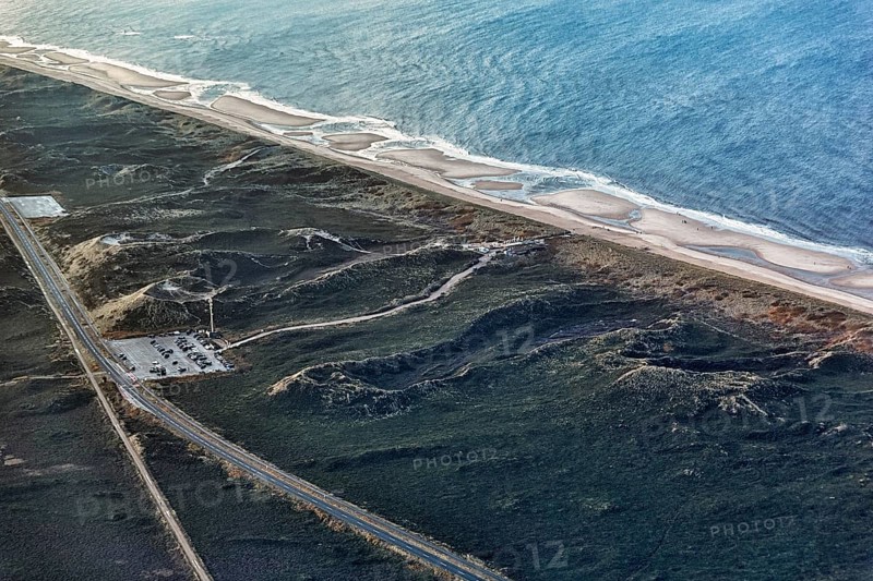 View of car park and driveway to the cult restaurant Sansibar in the dunes