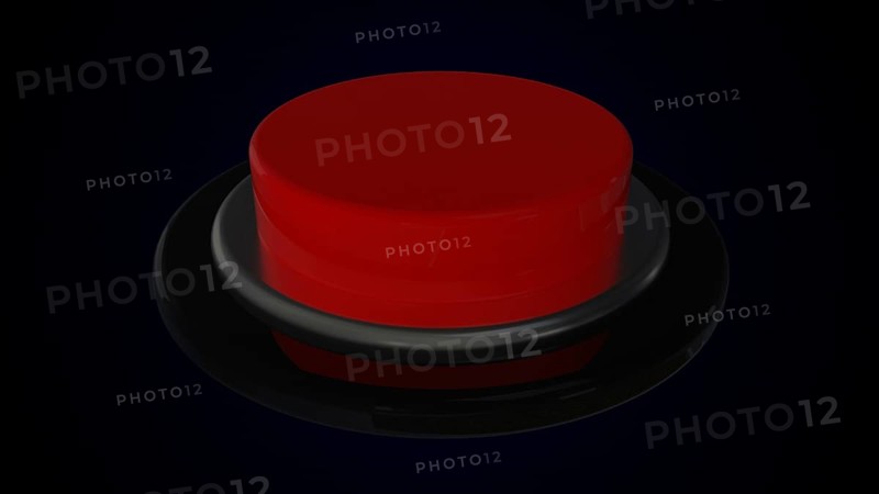 Red round push button bordered by a metallic ring