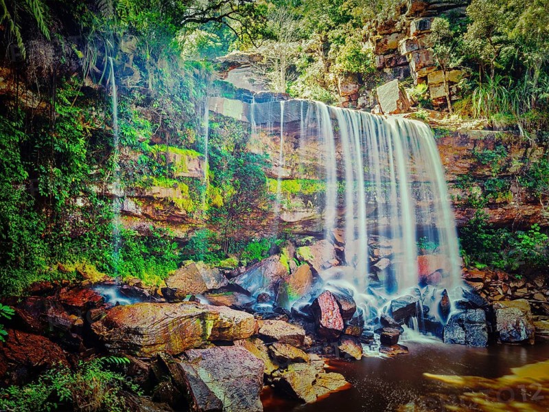 Vintage retro effect filtered hipster style image of tropical waterfall. Popokvil Waterfall